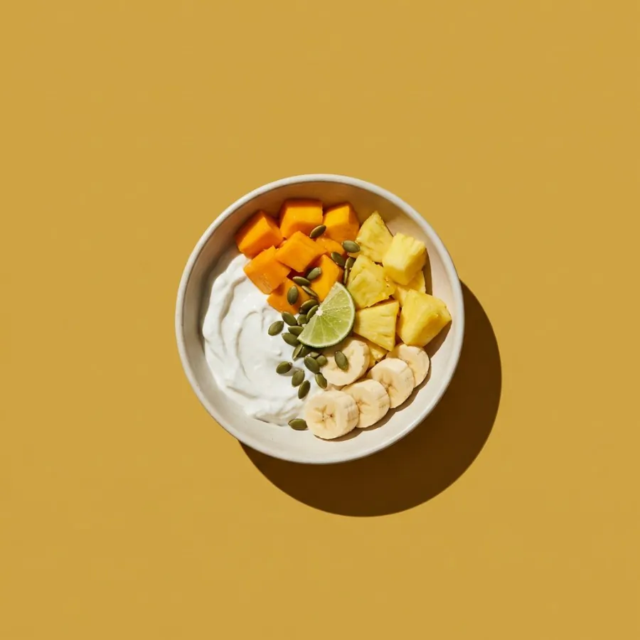 Tropical fruit bowls with coconut yogurt and seeds